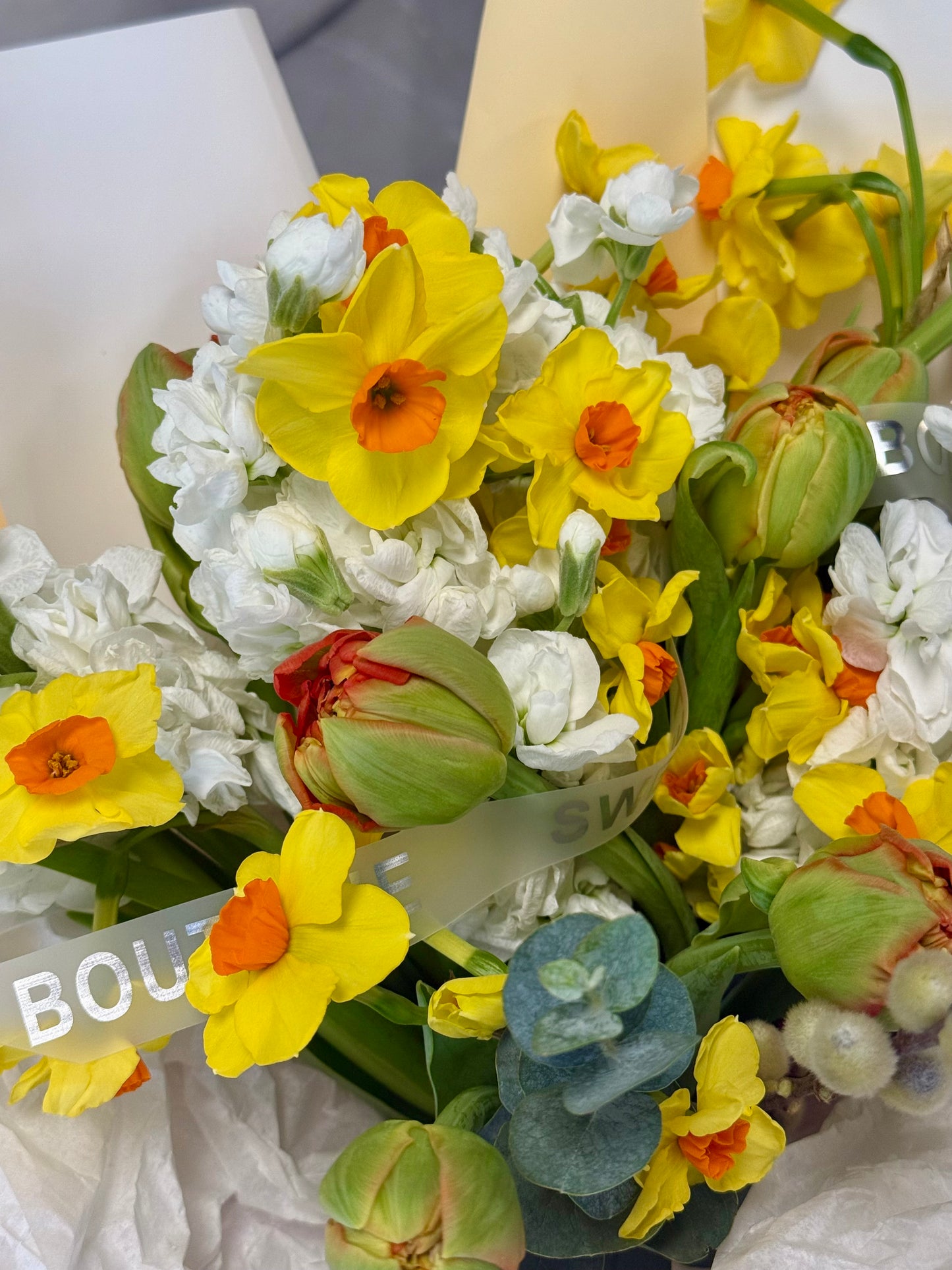 	tulips daffodils spring arrangement close up