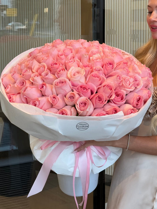 Oversized pink roses bouquet with ribbon luxury flowers