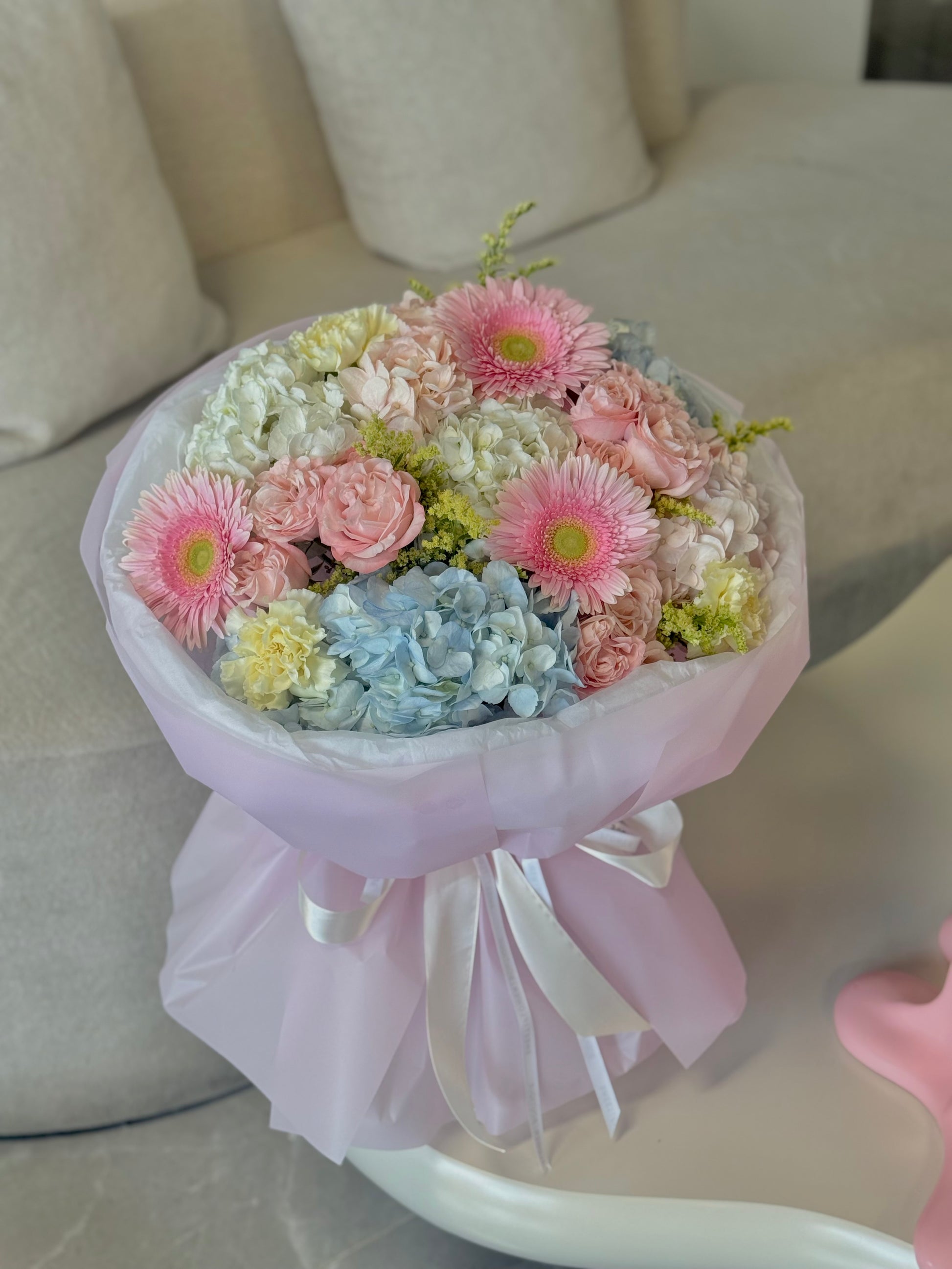 Summer Garden Bouquet with hydrangeas, pink roses, gerbera daisies, carnations, and pastel flowers in luxury blush wrapping by Sweet Flower Boutique Toronto
