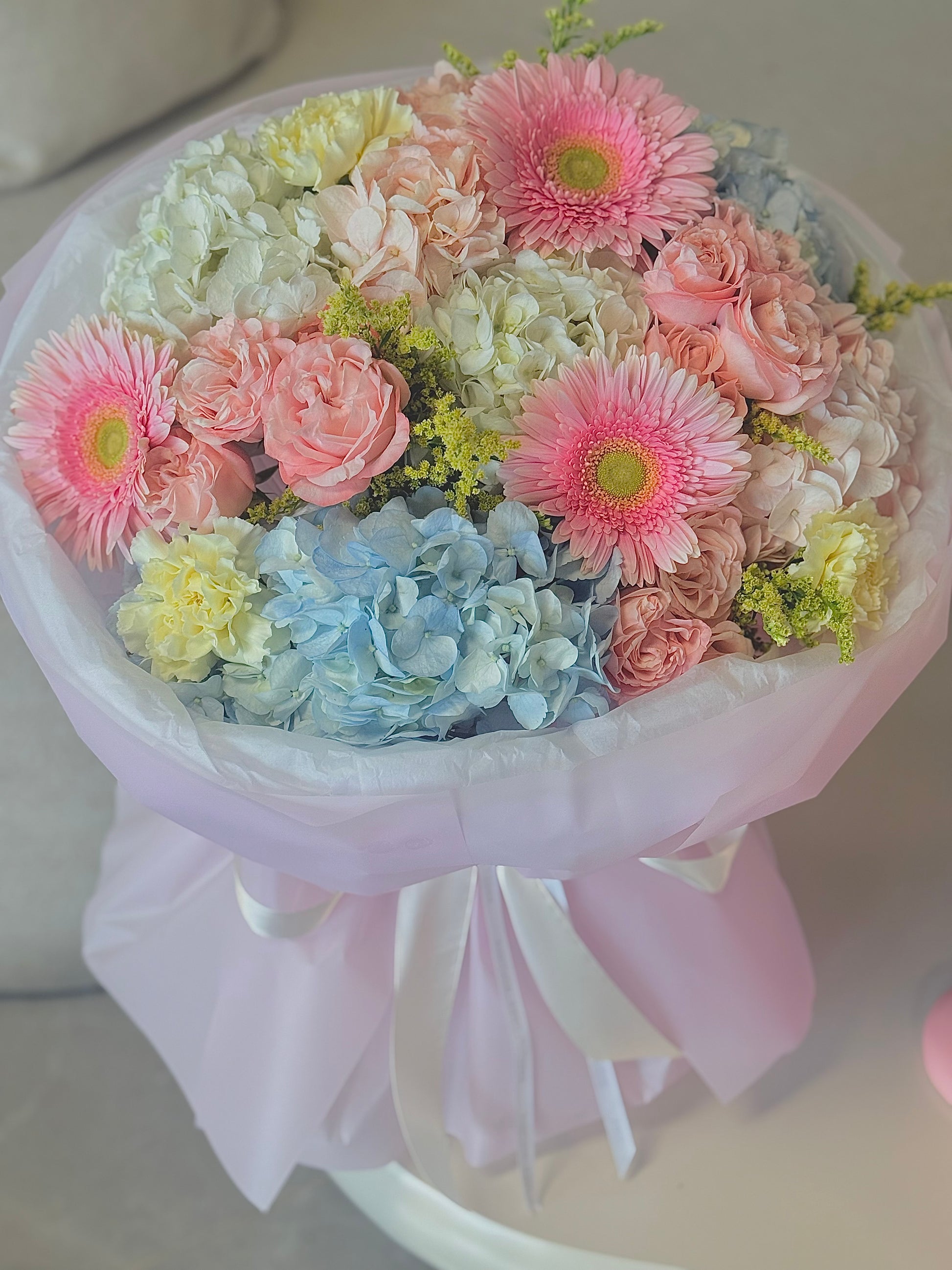 Luxury Summer Garden Bouquet featuring blue hydrangeas, blush roses, pink gerberas, and carnations for same-day flower delivery in Toronto
