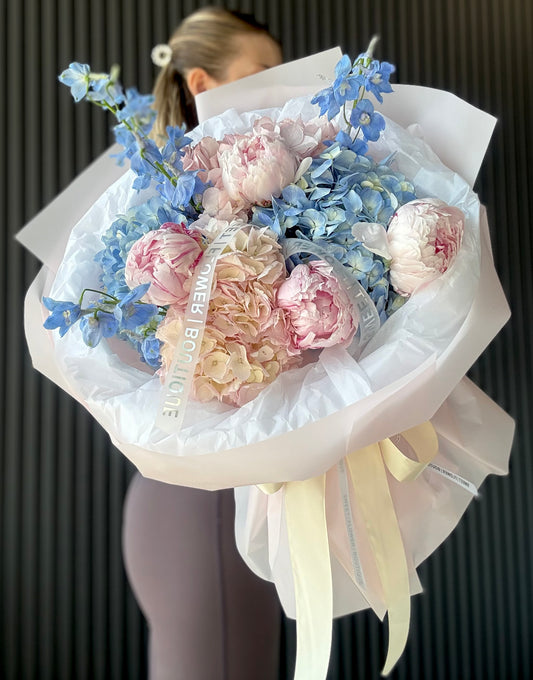 Luxury pastel blue and pink flower bouquet with hydrangeas