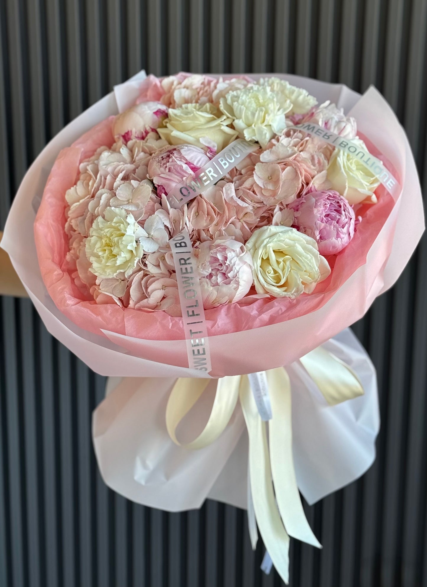 Luxury blush pink bouquet with peonies hydrangeas and white roses