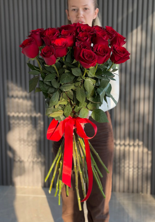 Luxury bouquet of premium 90 cm extra-long stem red roses with vibrant red blooms and elegant satin ribbon, available for flower delivery in Toronto and Etobicoke.
