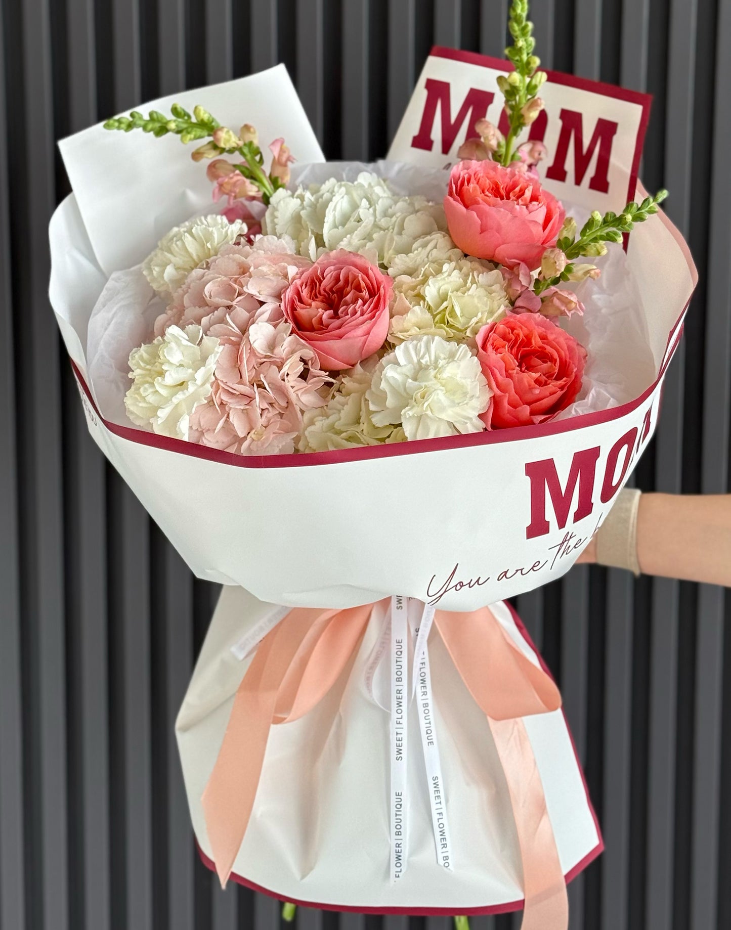 Premium Mother’s Day flowers Toronto coral garden roses hydrangea and carnations luxury wrapping