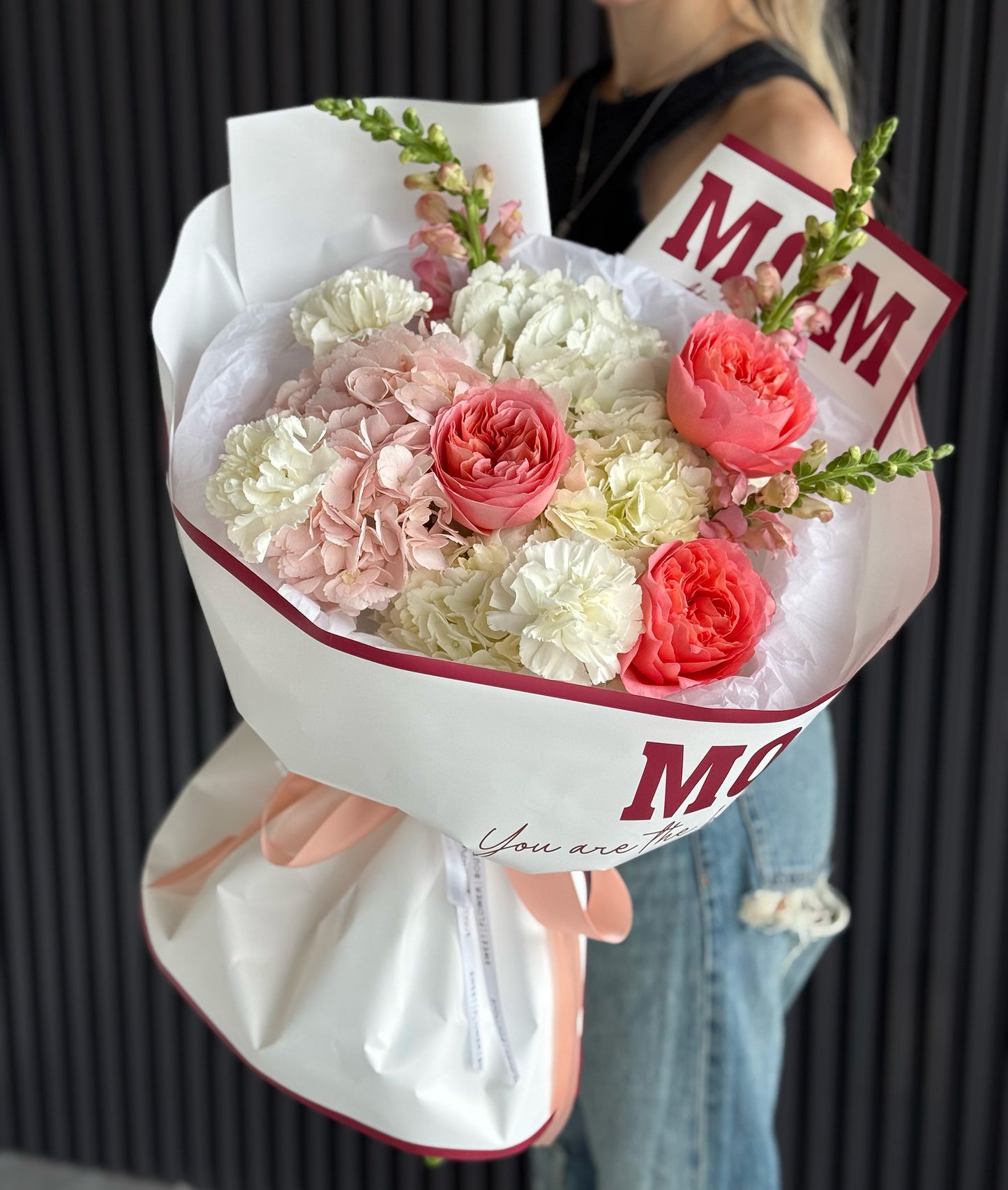 Soft pink and white Mother’s Day flower bouquet with garden roses hydrangea and carnations Sweet Flower Boutique